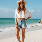 Model on beach wearing Stetson Flatrock